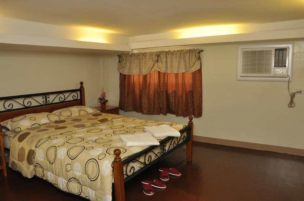 Pal-Watson Apartments Мактан Номер фото